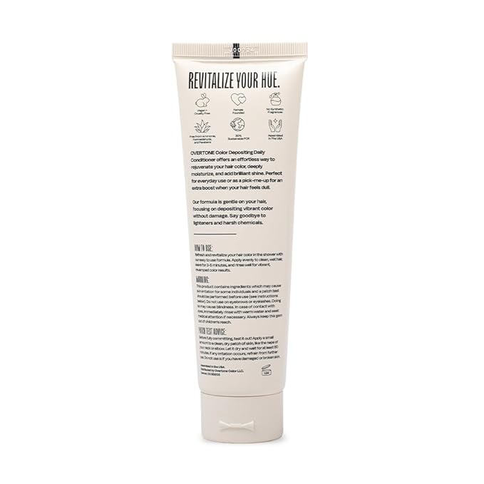 Tube of hair color product with text on a white background
